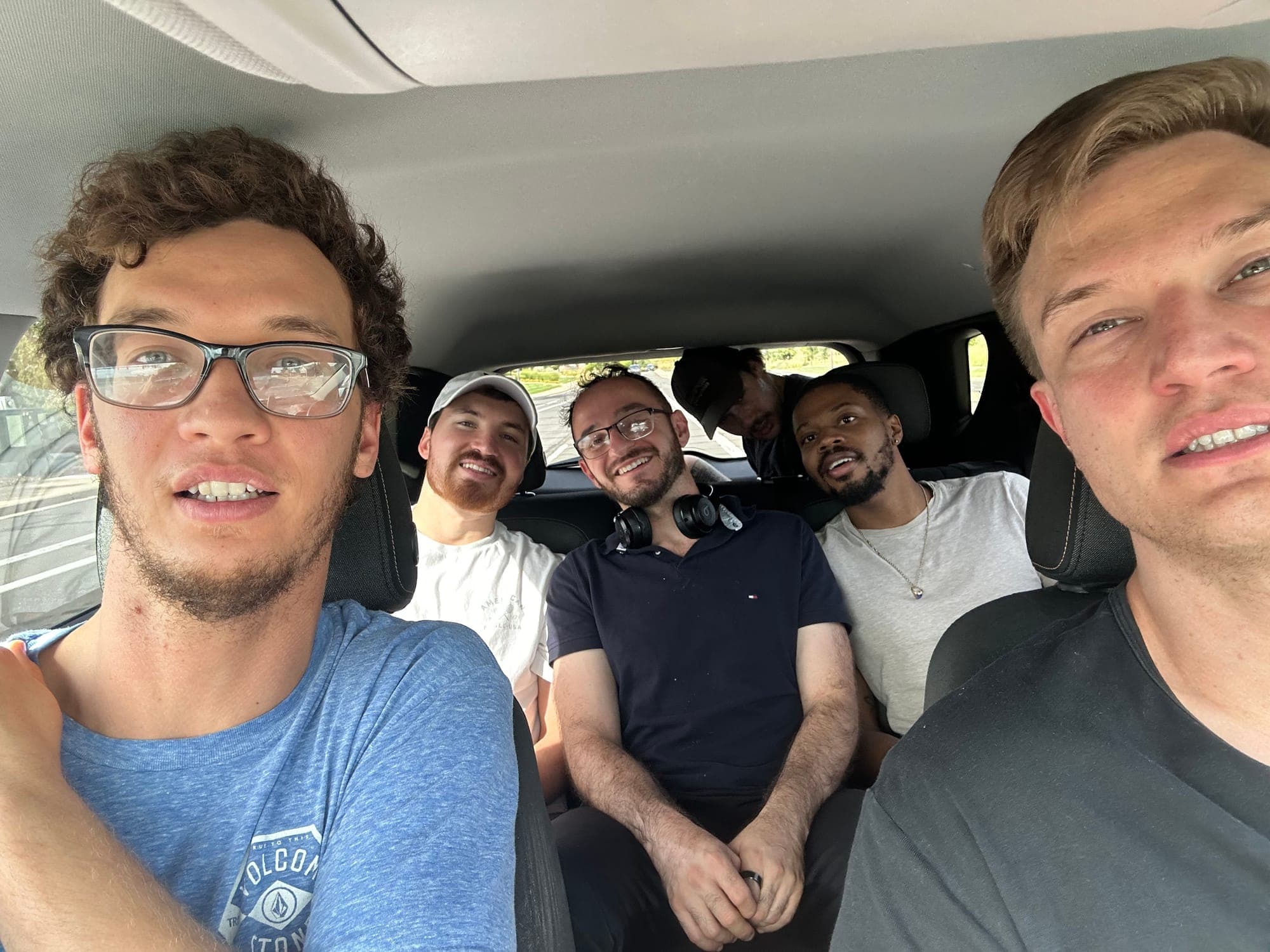The drive up, a car full of men