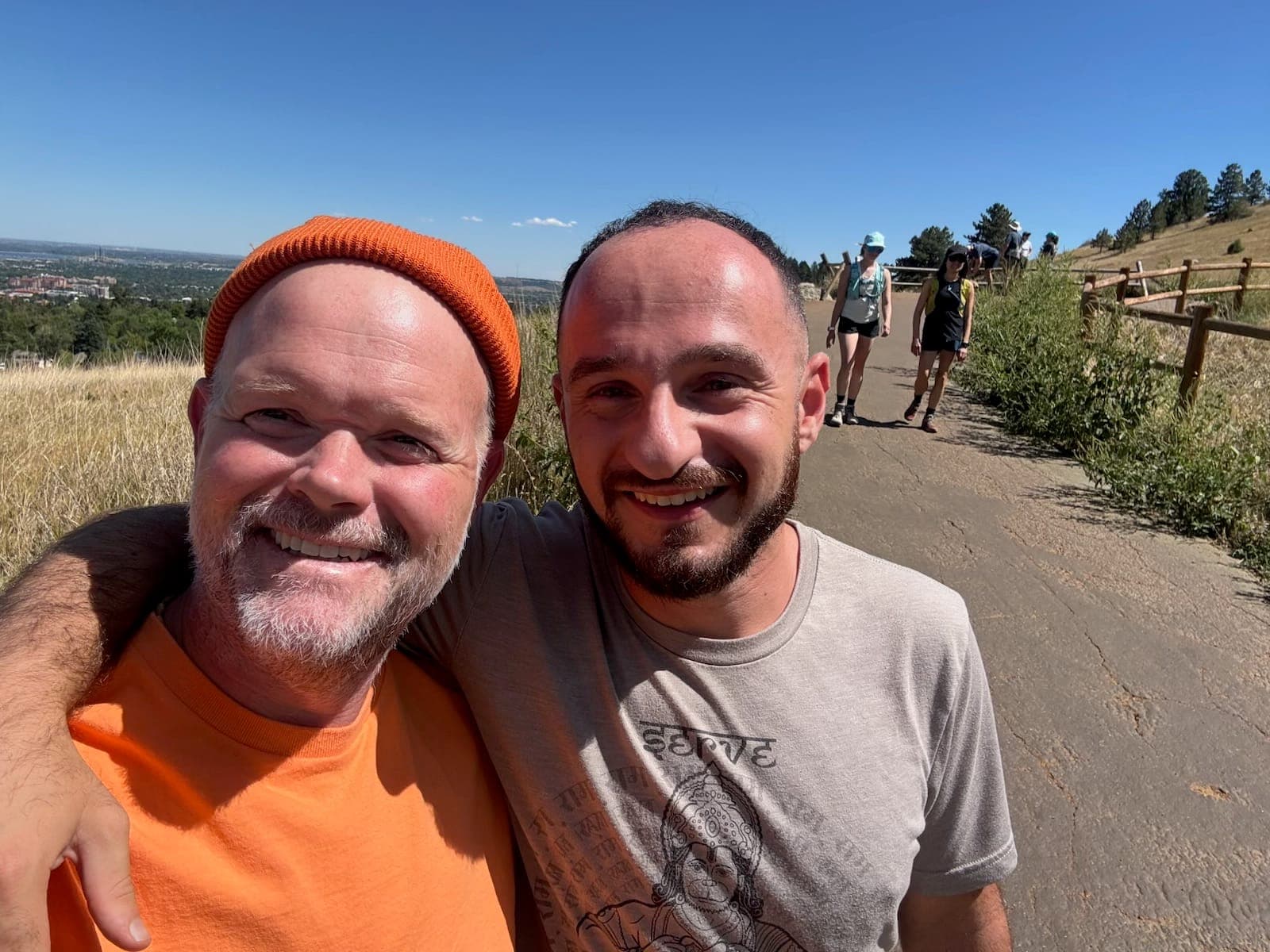 Two men on the trail above the foothills