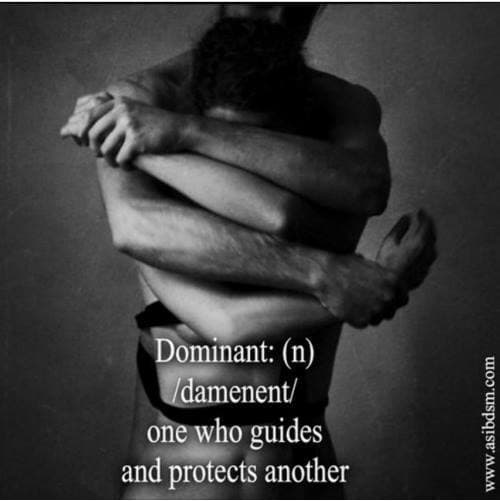 Black-and-white image of two people embracing, with text defining dominant as one who guides and protects another.